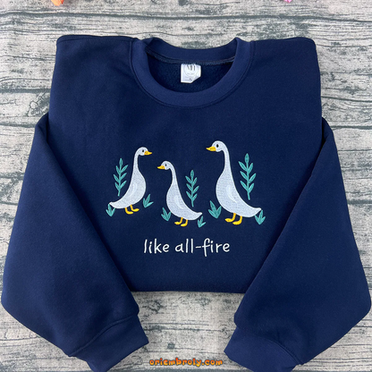 Like All Fire Goose embroidered sweatshirt inspired by The Hunger Games