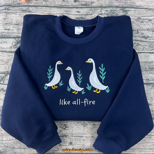 Like All Fire Goose embroidered sweatshirt inspired by The Hunger Games