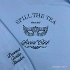 masquerade mask embroidery detail on regency crewneck sweatshirt