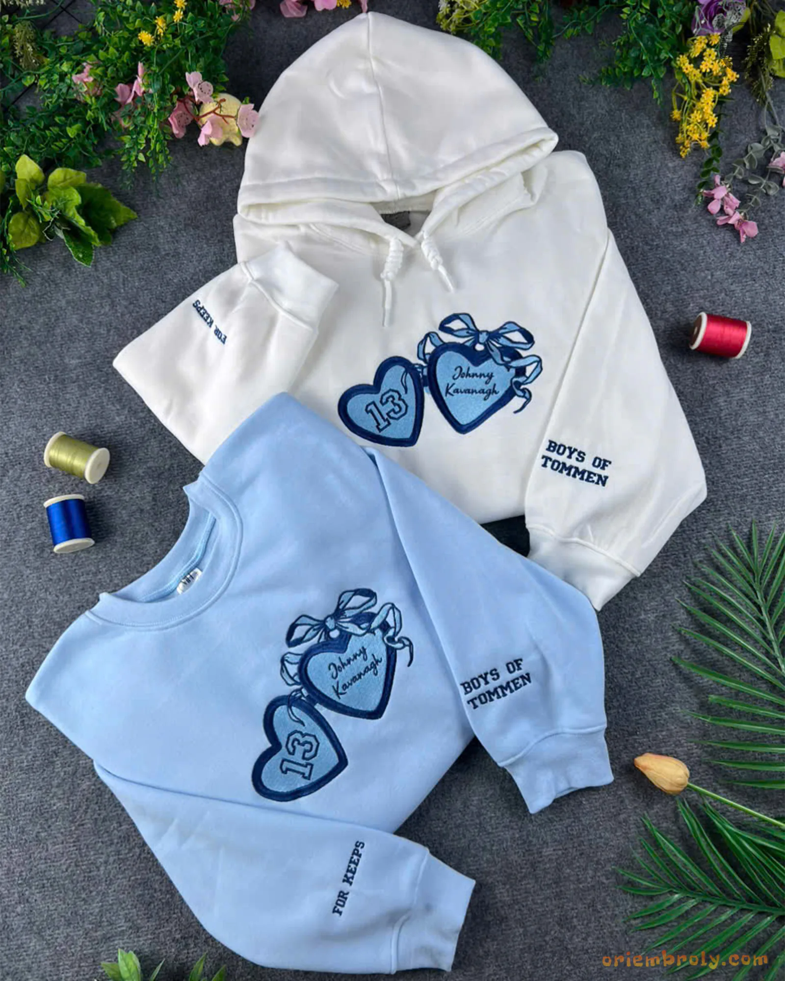 Matching white hoodie and light blue crewneck sweatshirt featuring coquette embroidered hearts for best friends