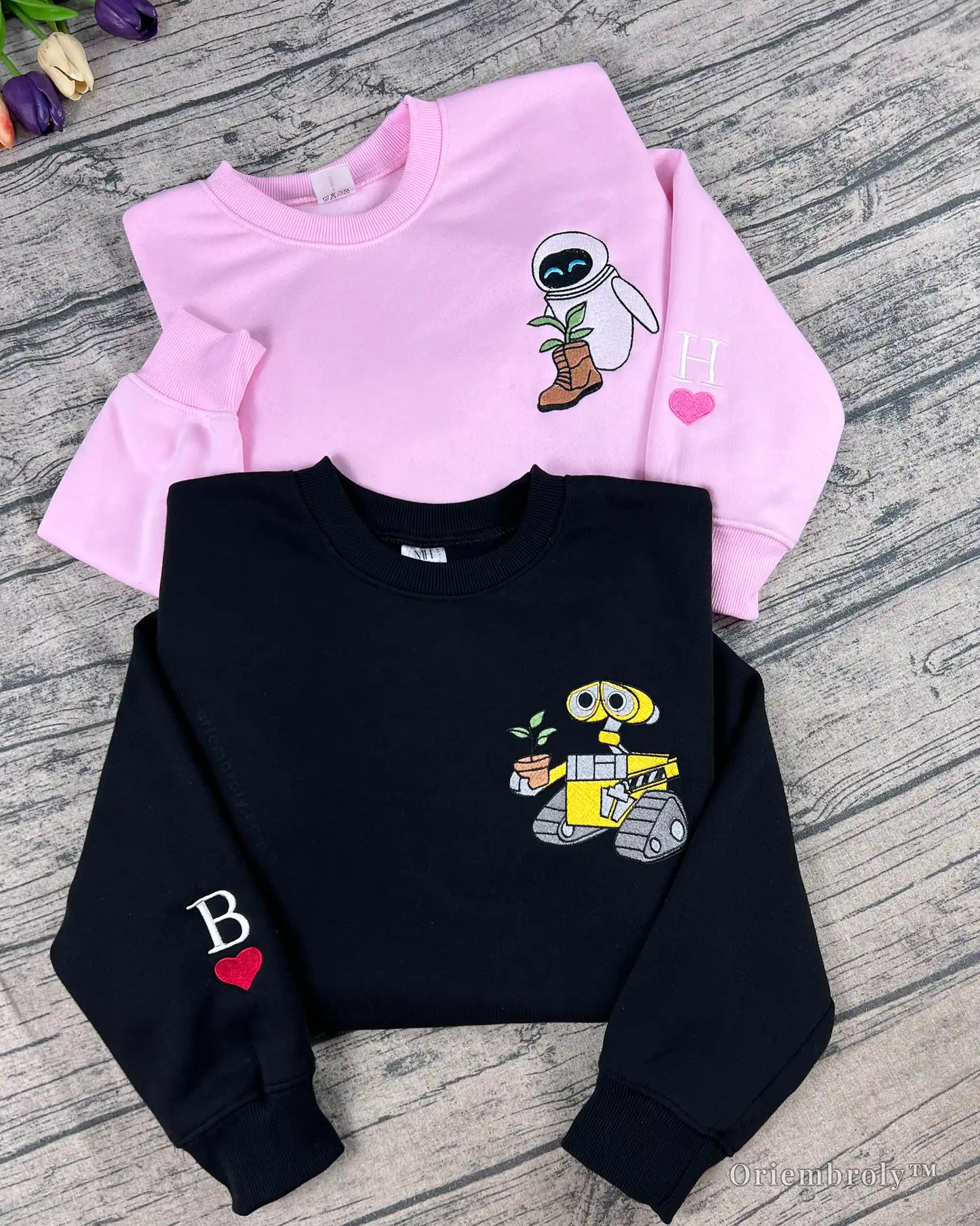 personalized initial and heart embroidery on sweatshirt sleeve