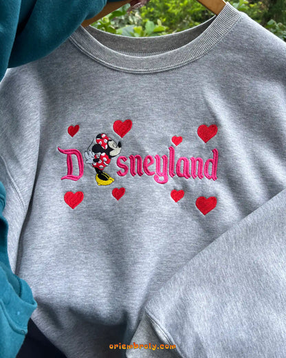 Disneyland couple sweatshirt featuring Mickey Mouse and Minnie Mouse embroidery