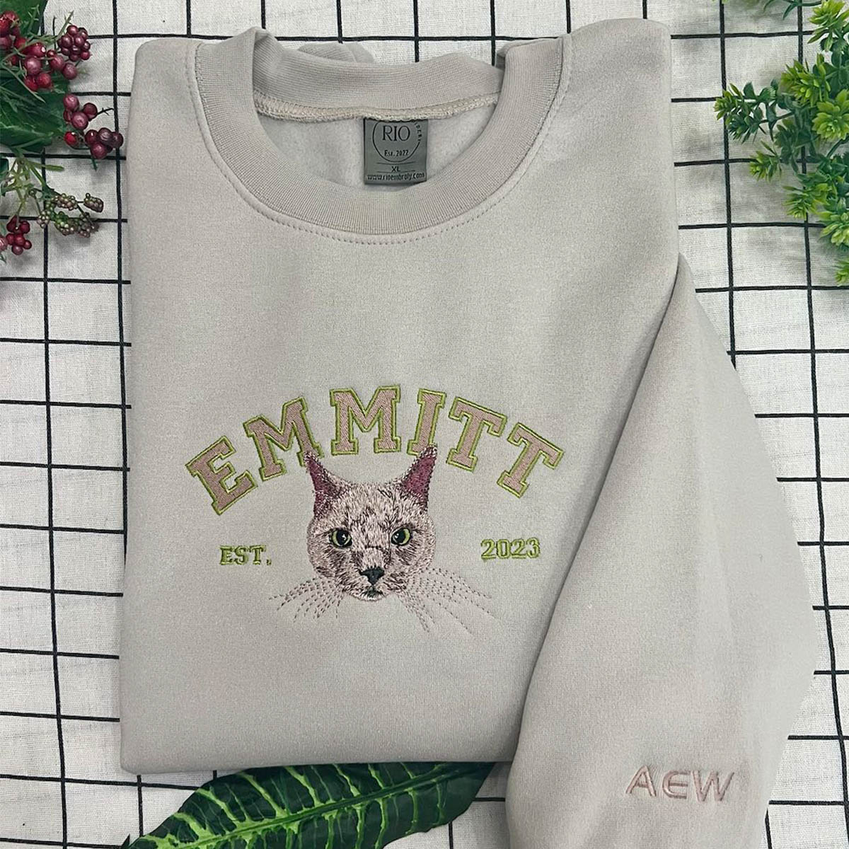 Matching pet and owner sweatshirts with custom pet embroidery.