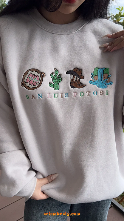 Embroidered cactus and local symbols on Mexico sweatshirt