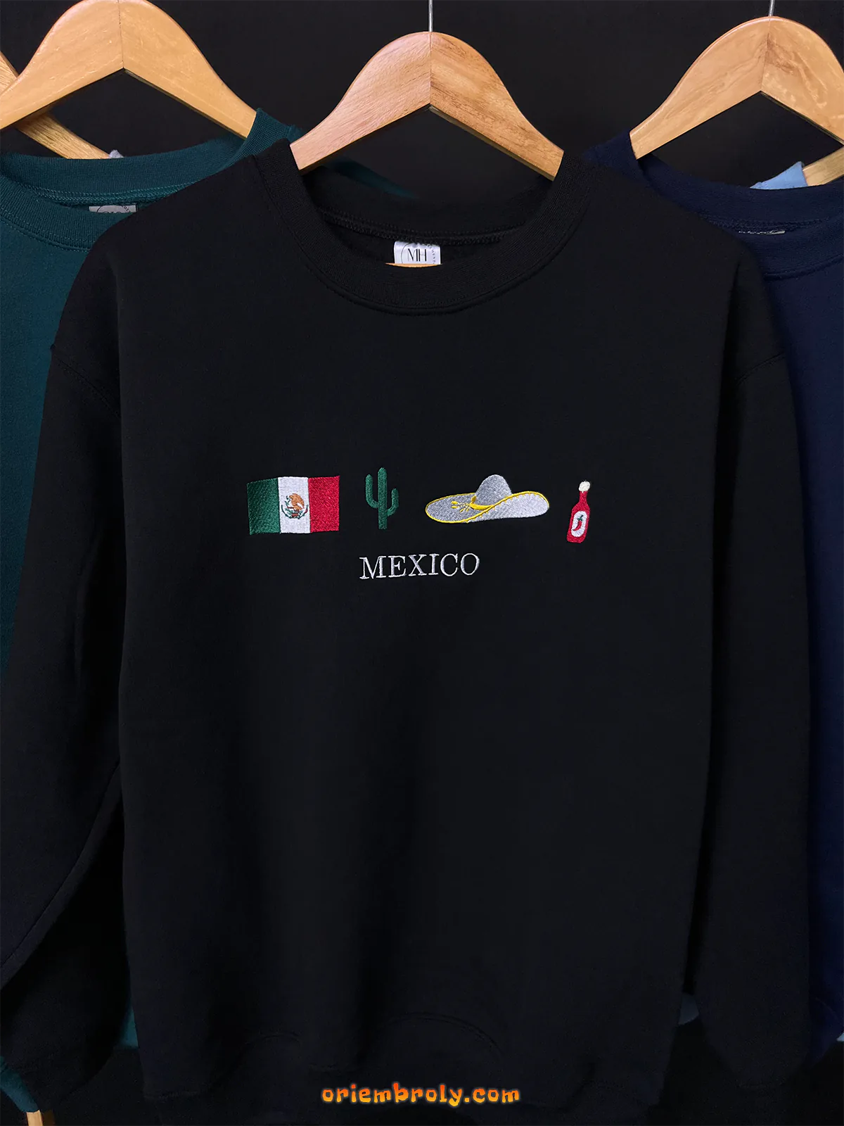 Black Mexico jumper with sombrero and hot sauce icons