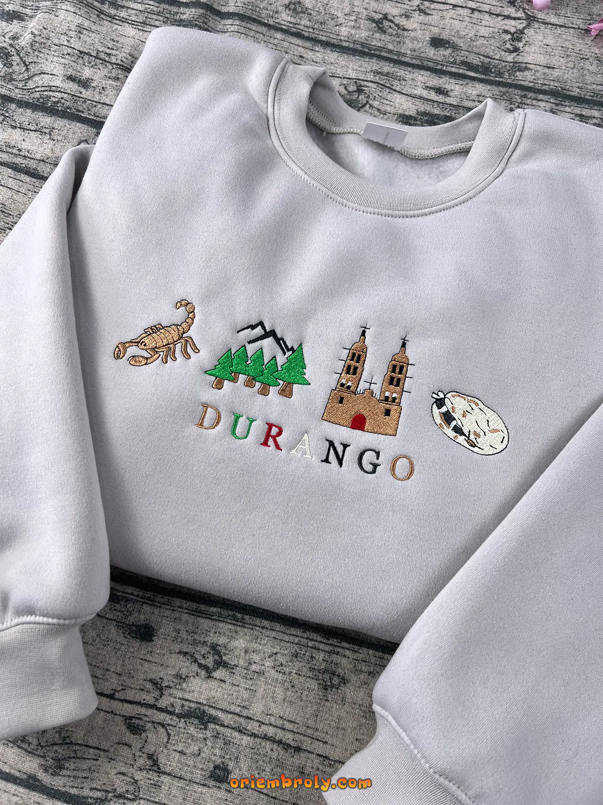 Aesthetic Durango sweatshirt featuring embroidered Mexican symbols