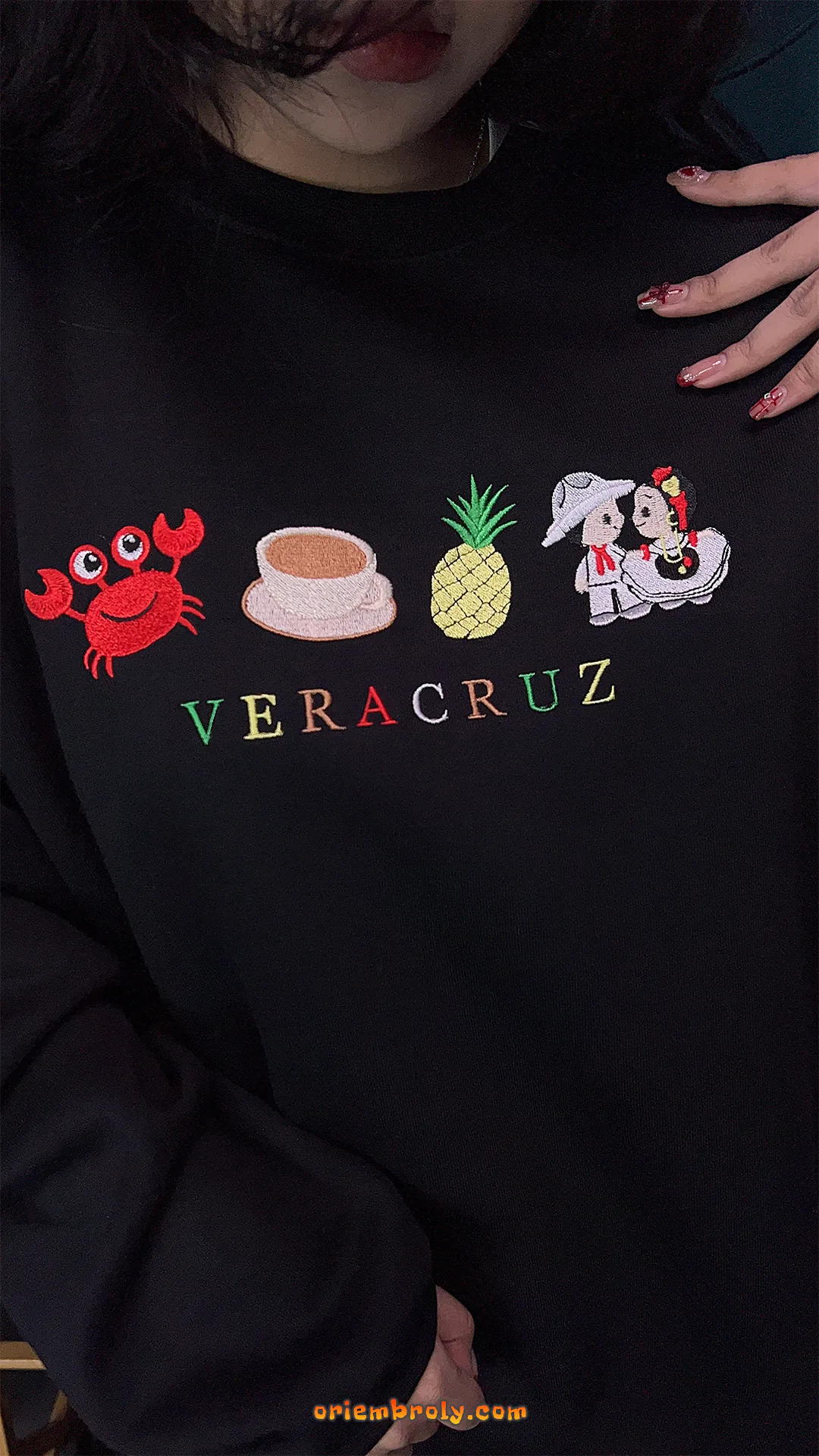 Black pullover with embroidered Veracruz letters and symbols