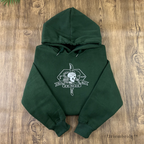 Military insignia style skull embroidery on hoodie