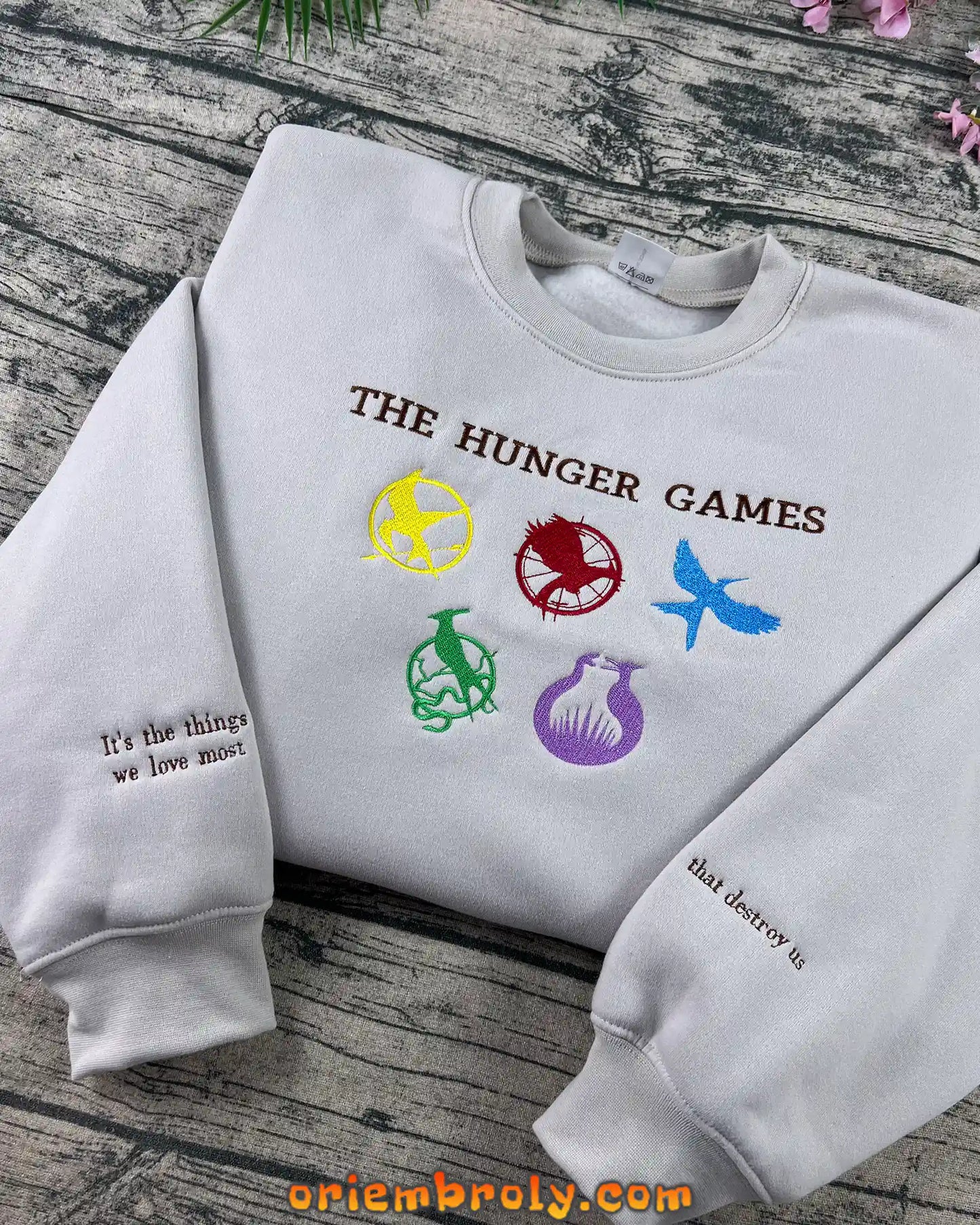 Mockingjay and symbols embroidery on fan crewneck