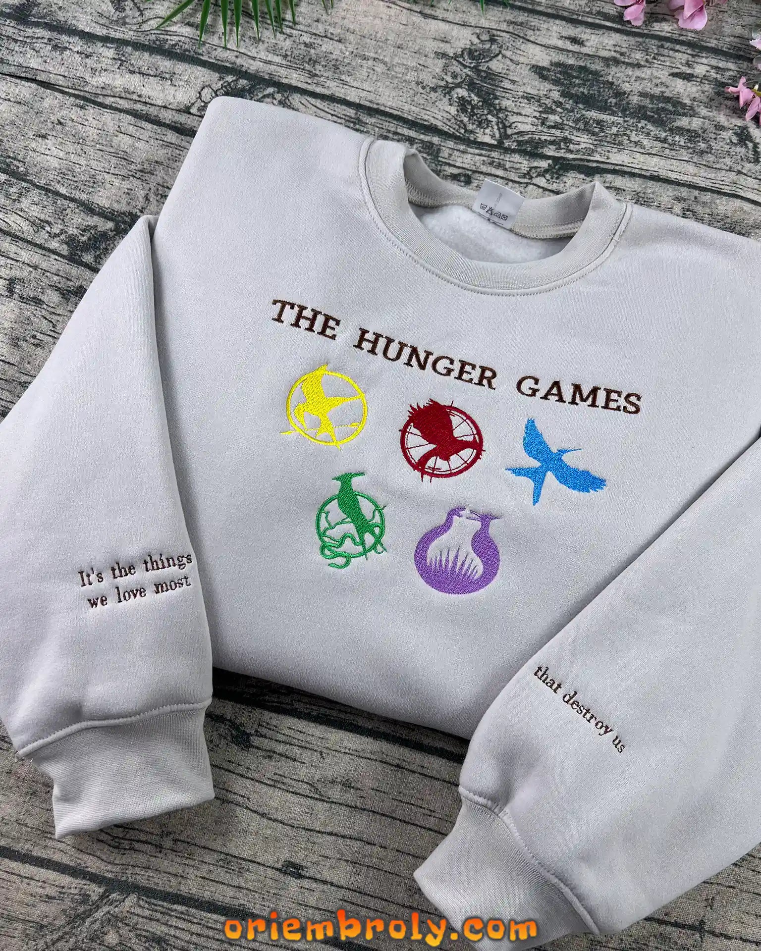 Mockingjay and symbols embroidery on fan crewneck