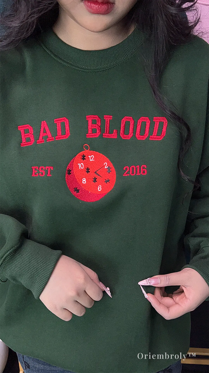 mystery reader wearing embroidered bookish sweatshirt