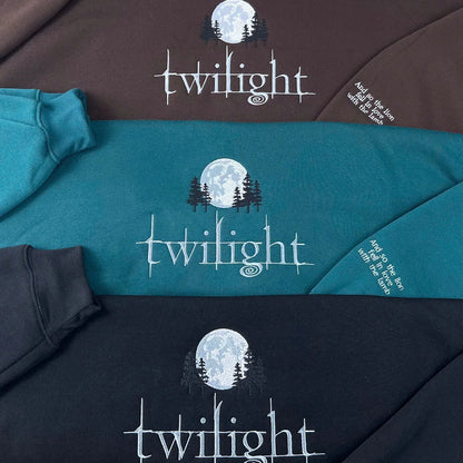 Twilight-themed bedding set with moon and tree design on a brown, blue, and black background.