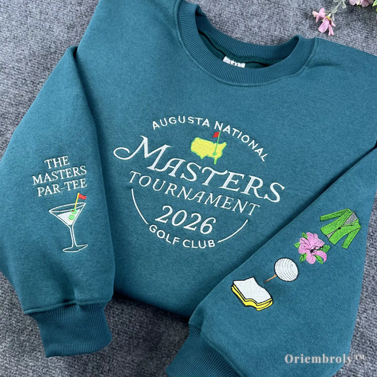 Old money aesthetic teal sweatshirt with embroidered golf icons and Masters 2026 logo. Perfect for a preppy country club look or sophisticated casual streetwear