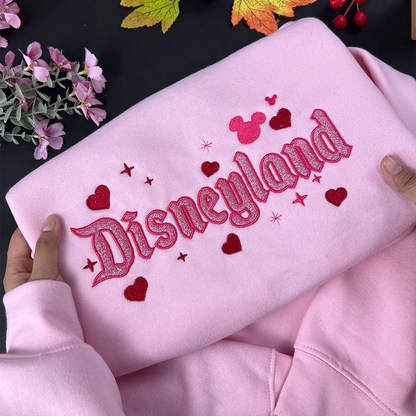 Pastel pink crewneck with sparkly embroidery