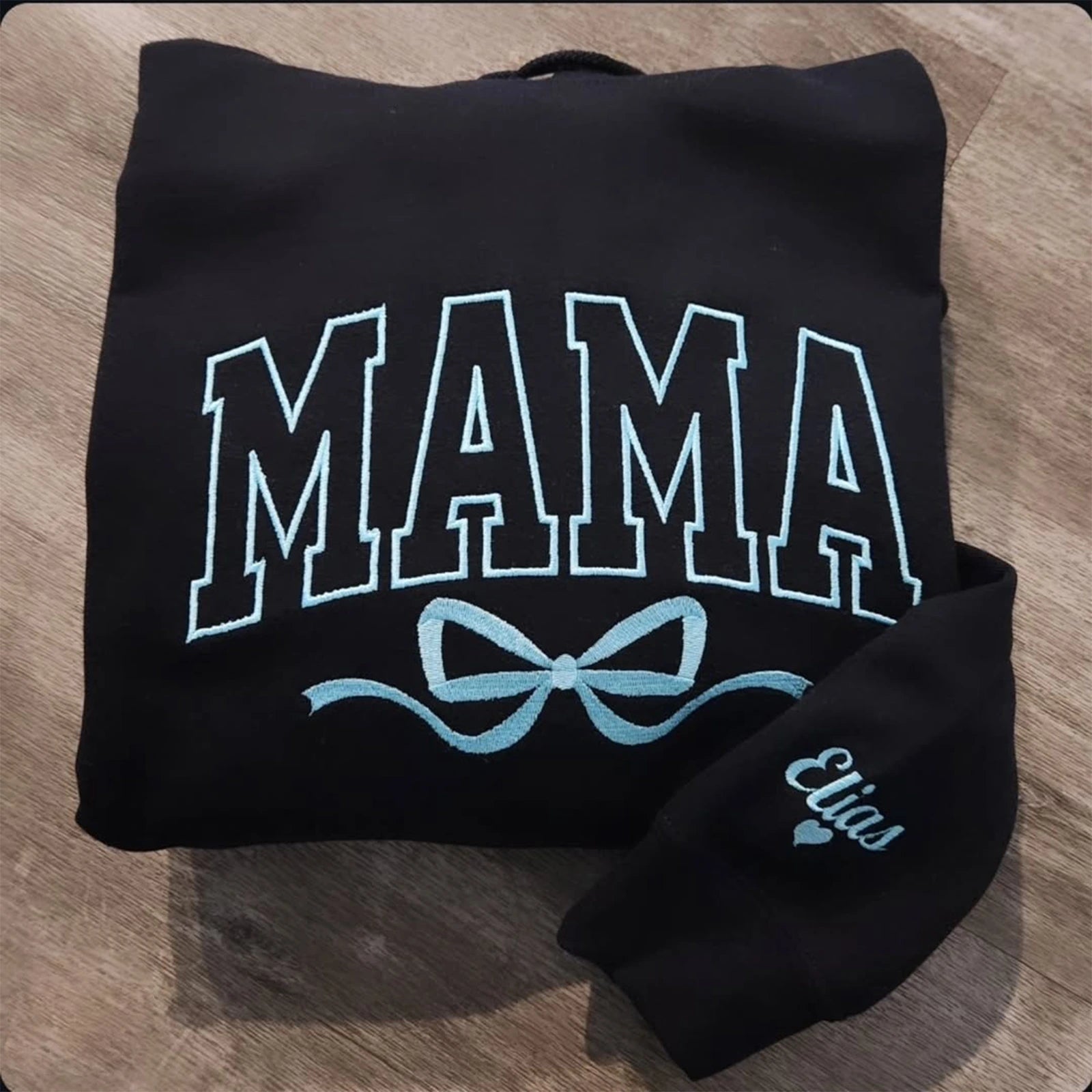 Front view of the Personalized Mama Bow Embroidered Sweatshirt