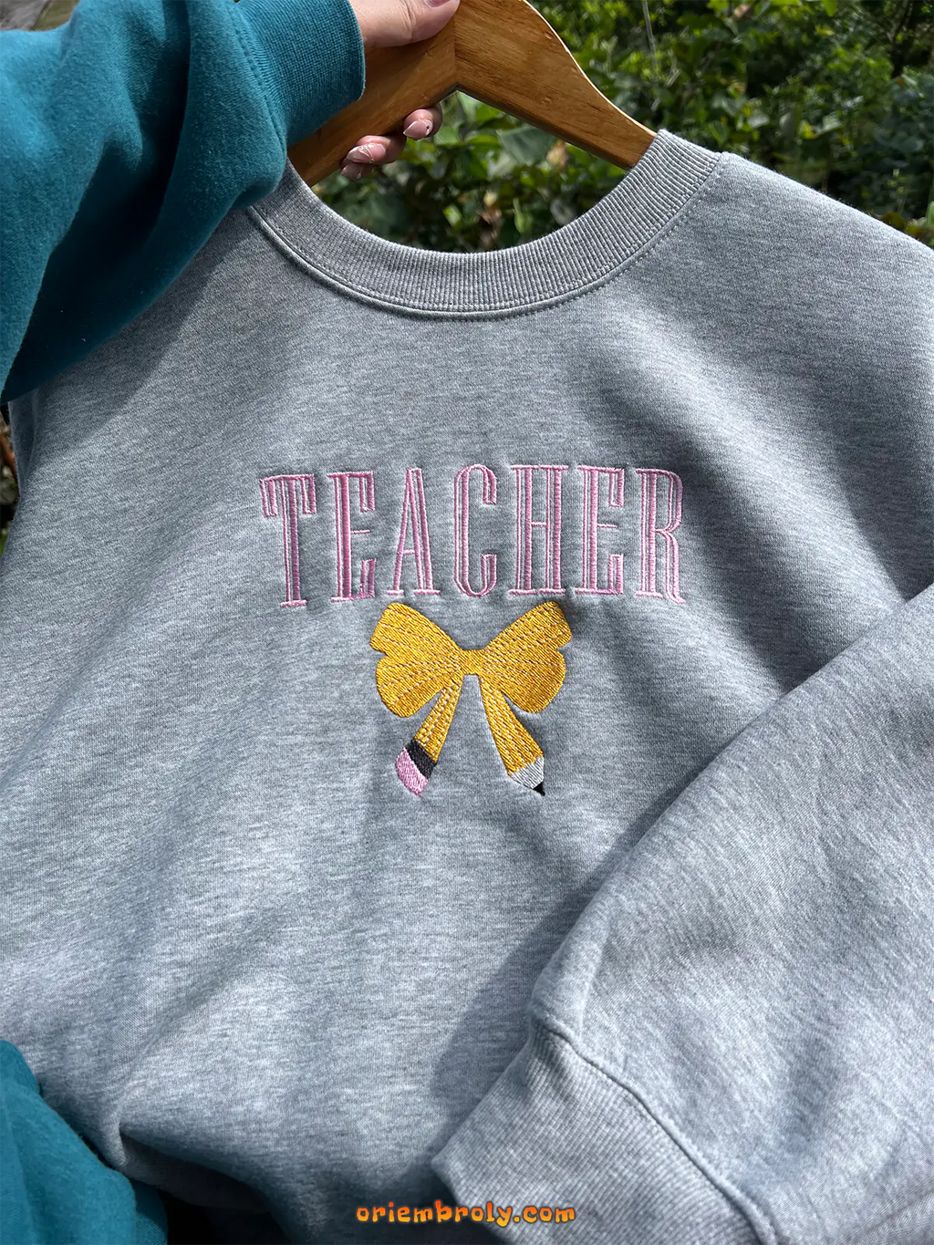Personalized teacher gift sweatshirt with bow detail