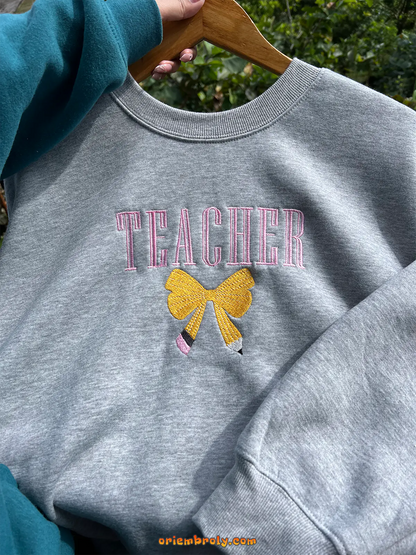 Personalized teacher gift sweatshirt with bow detail