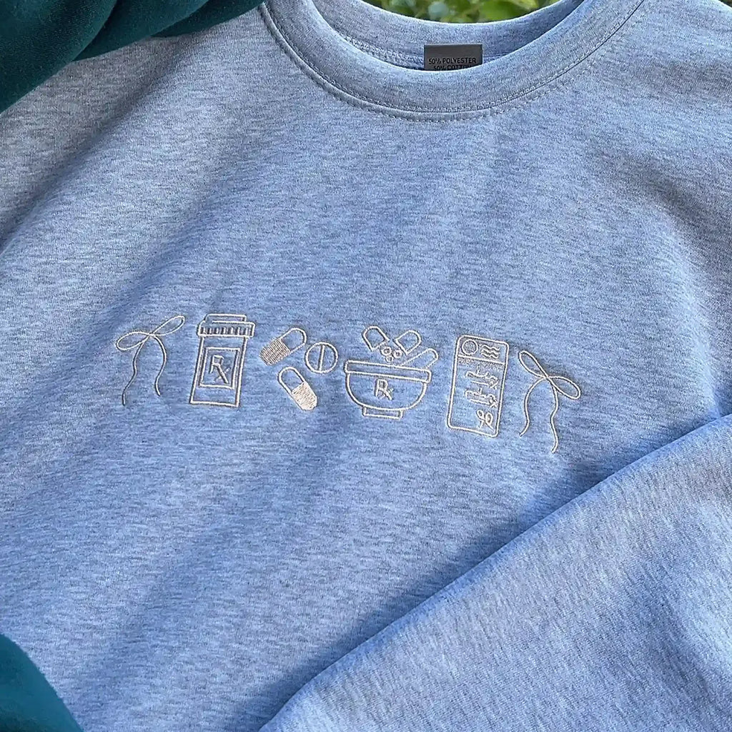 Pharmacy icon embroidered crewneck