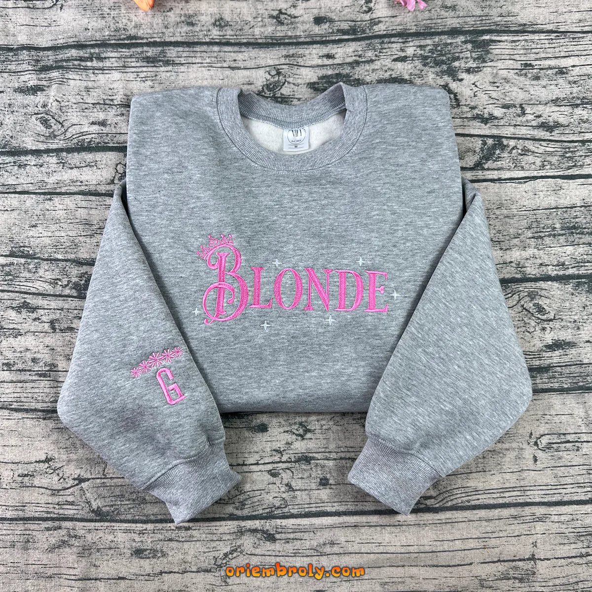 Custom pink crewneck with BLONDE embroidery