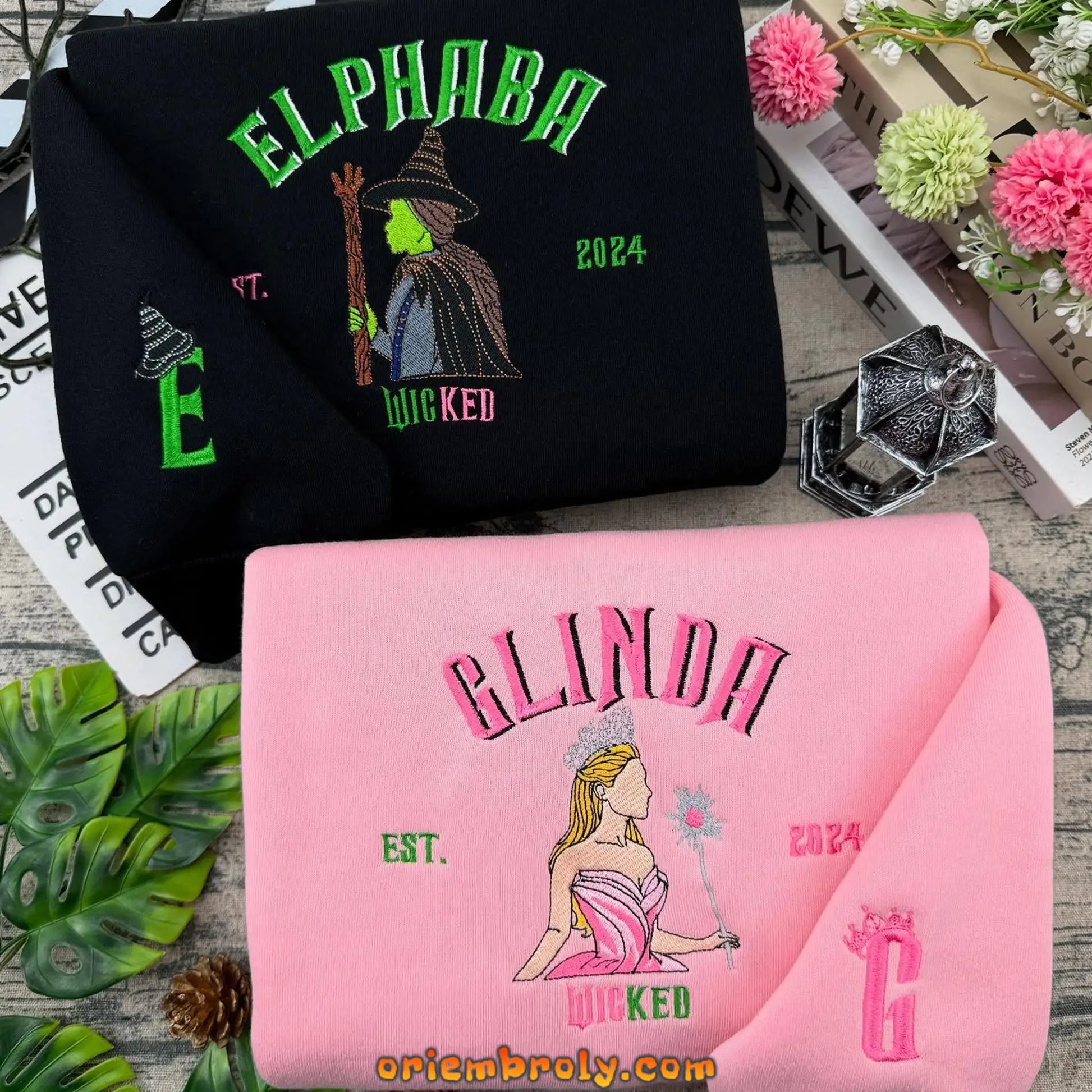 Pink Witch & Green Witch embroidered hoodie front view