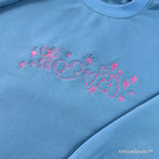 pink hearts and stars embroidery detail on aesthetic sweatshirt