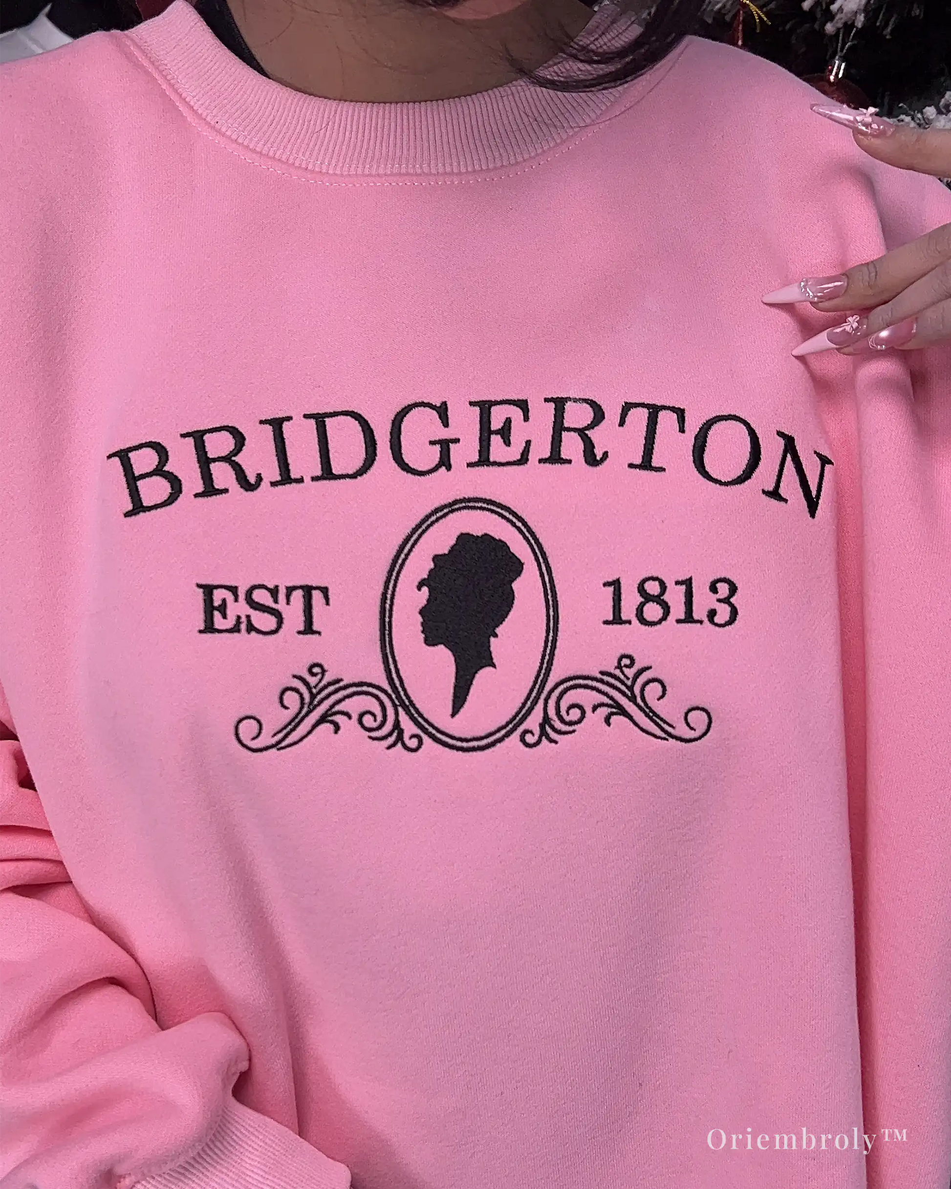 pink regency era embroidered crewneck flat lay