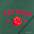 red pocket watch embroidery detail on bookish sweatshirt