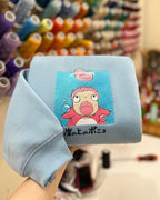Ponyo goldfish princess looking at ham slice anime embroidered vintage crewneck sweatshirt in light blue