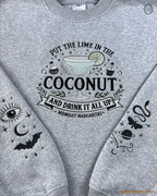 Grey Practical Magic sweatshirt featuring coconut lime margarita graphic and celestial sleeve embroidery