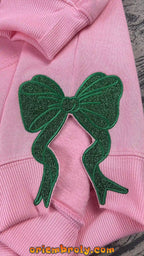 Close-up of Defying Gravity embroidery stitching