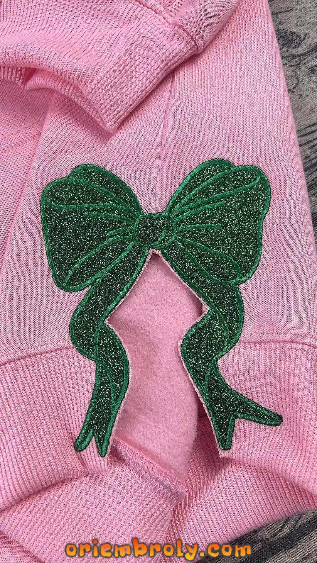 Close-up of Defying Gravity embroidery stitching