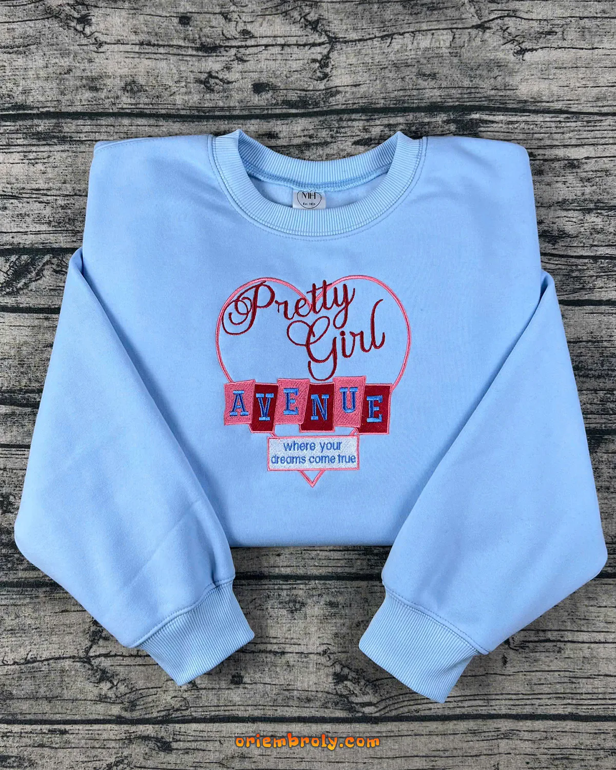 SC inspired cozy embroidered crewneck sweater