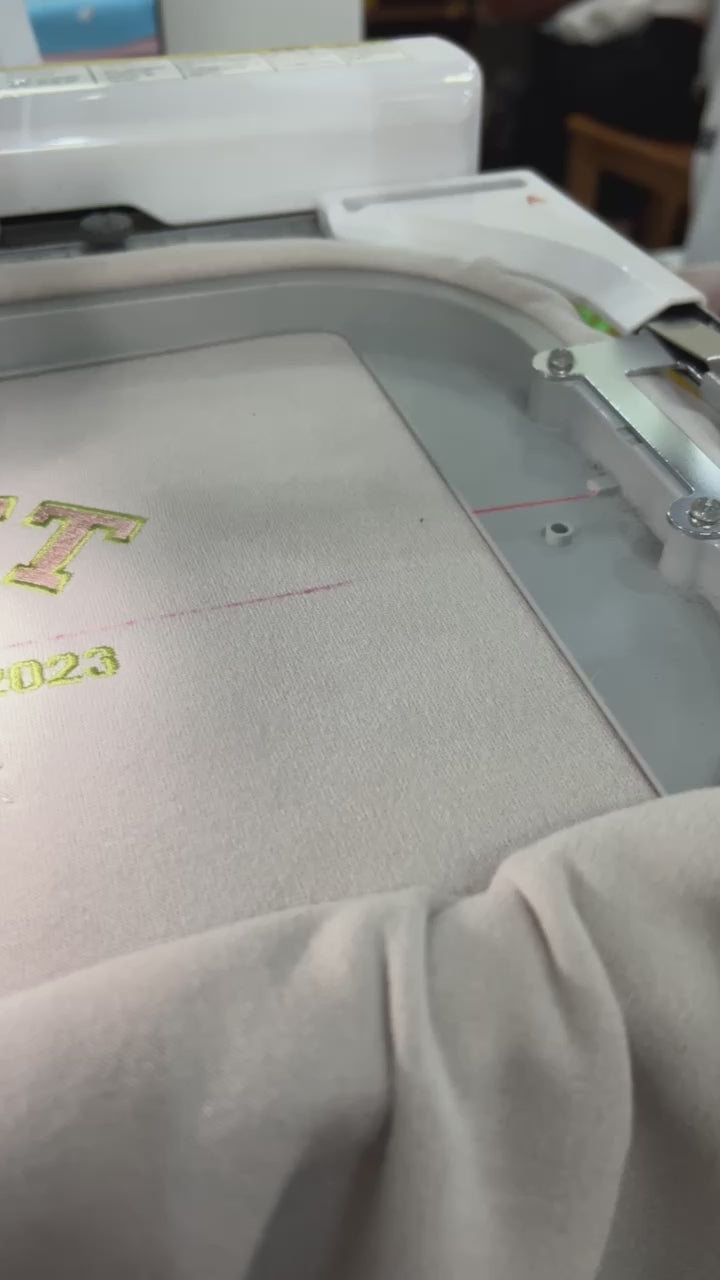 Matching pet and owner sweatshirts with custom pet embroidery.
