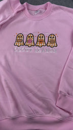 Video showing hand trimming threads and embroidery finishing process for a cute pink Spooky Season plaid ghosts sweatshirt