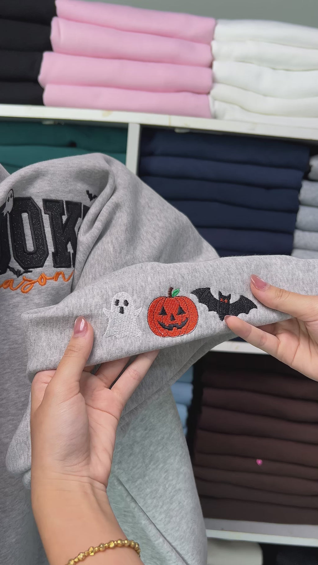 Embroidered Halloween bat pumpkin and ghost on sweatshirt sleeve