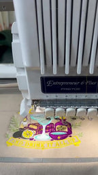 Video process of embroidering Put The Lime In The Coconut design with witchy frog graphics on a crewneck sweater