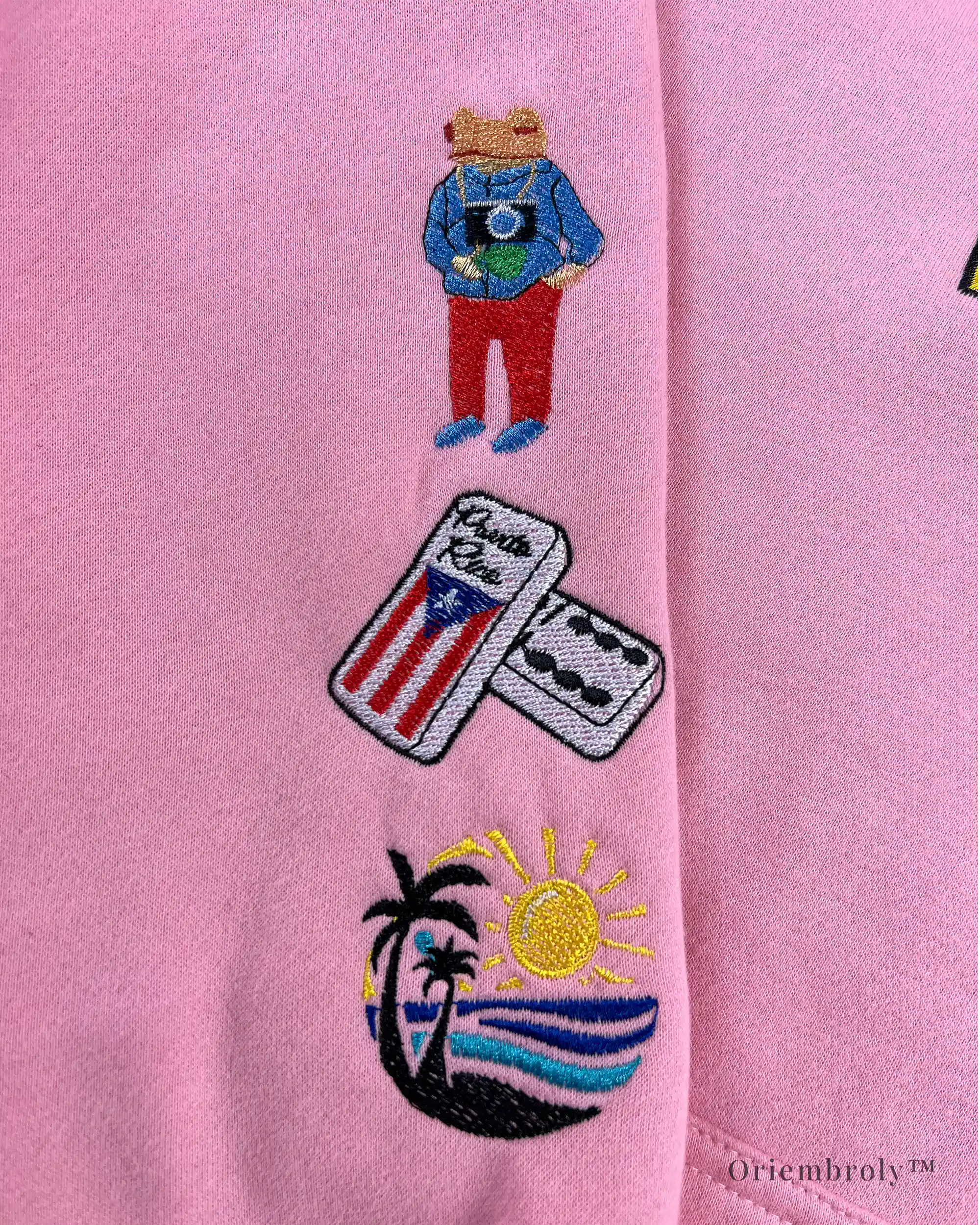 Detailed embroidered patches on Benito Bowl sweatshirt