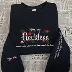 Reckless embroidered sweatshirt featuring Kai and Paedyn from Lauren Roberts Merch, a powerful book shirt for fantasy lovers.
