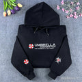Black Resident Evil Umbrella Corporation embroidered hoodie with sleeve logo details
