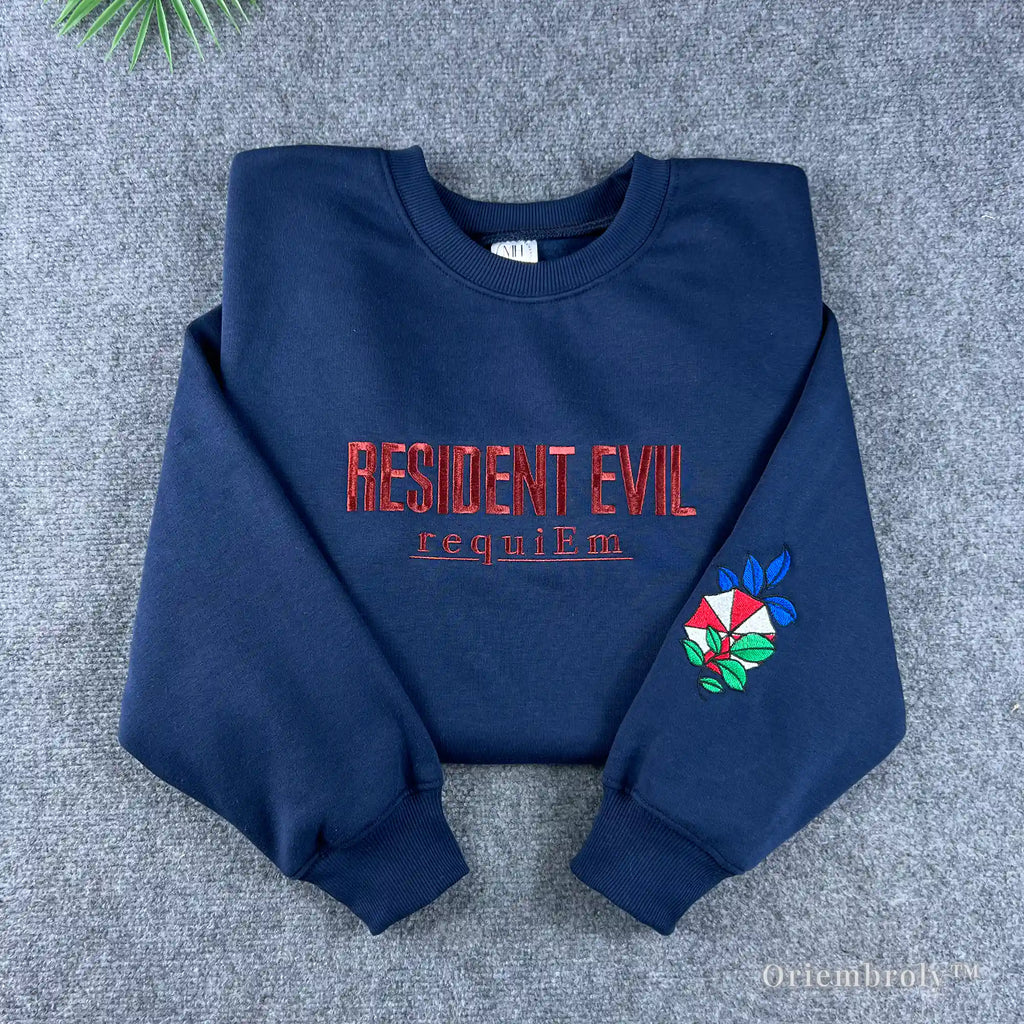Navy Resident Evil Umbrella Corp embroidered sweatshirt with red lettering and sleeve logo.
