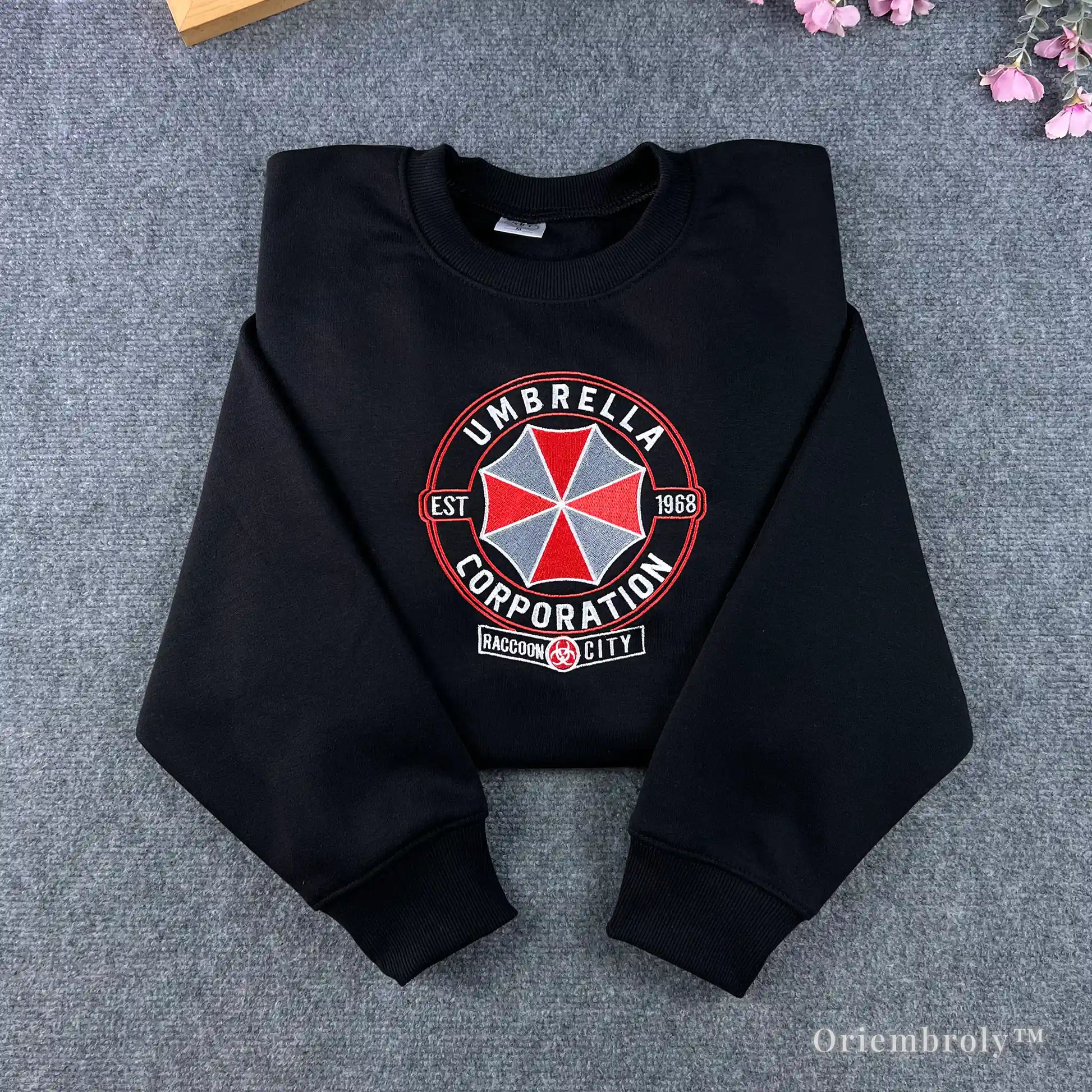 Black Resident Evil sweatshirt with large Umbrella Corporation logo embroidery on chest