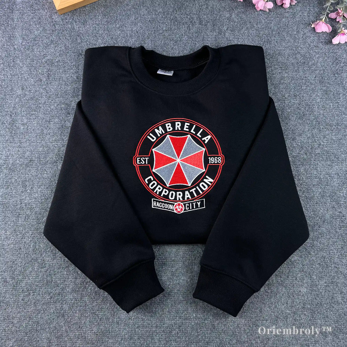 Black Resident Evil sweatshirt with large Umbrella Corporation logo embroidery on chest