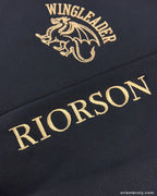 Metallic gold Riorson embroidery on left sleeve