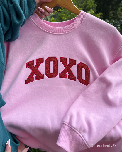 Cozy crewneck sweatshirt with XOXO love message