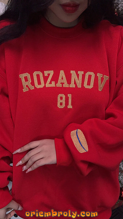 Hockey puck embroidery detail on Rozanov 81 sweatshirt