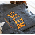 Gray tank top with 'Salem, Massachusetts' text on a white background