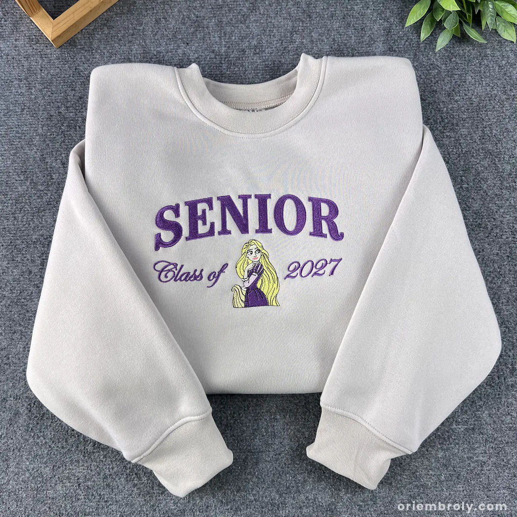 Senior Class of 2026 embroidered cream sweatshirt with fairytale princess design