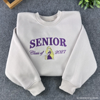 Senior Class of 2026 embroidered cream sweatshirt with fairytale princess design