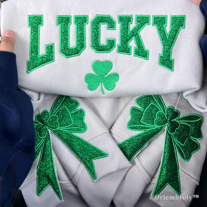 close-up shamrock bow embroidery with 3D satin stitch detail
