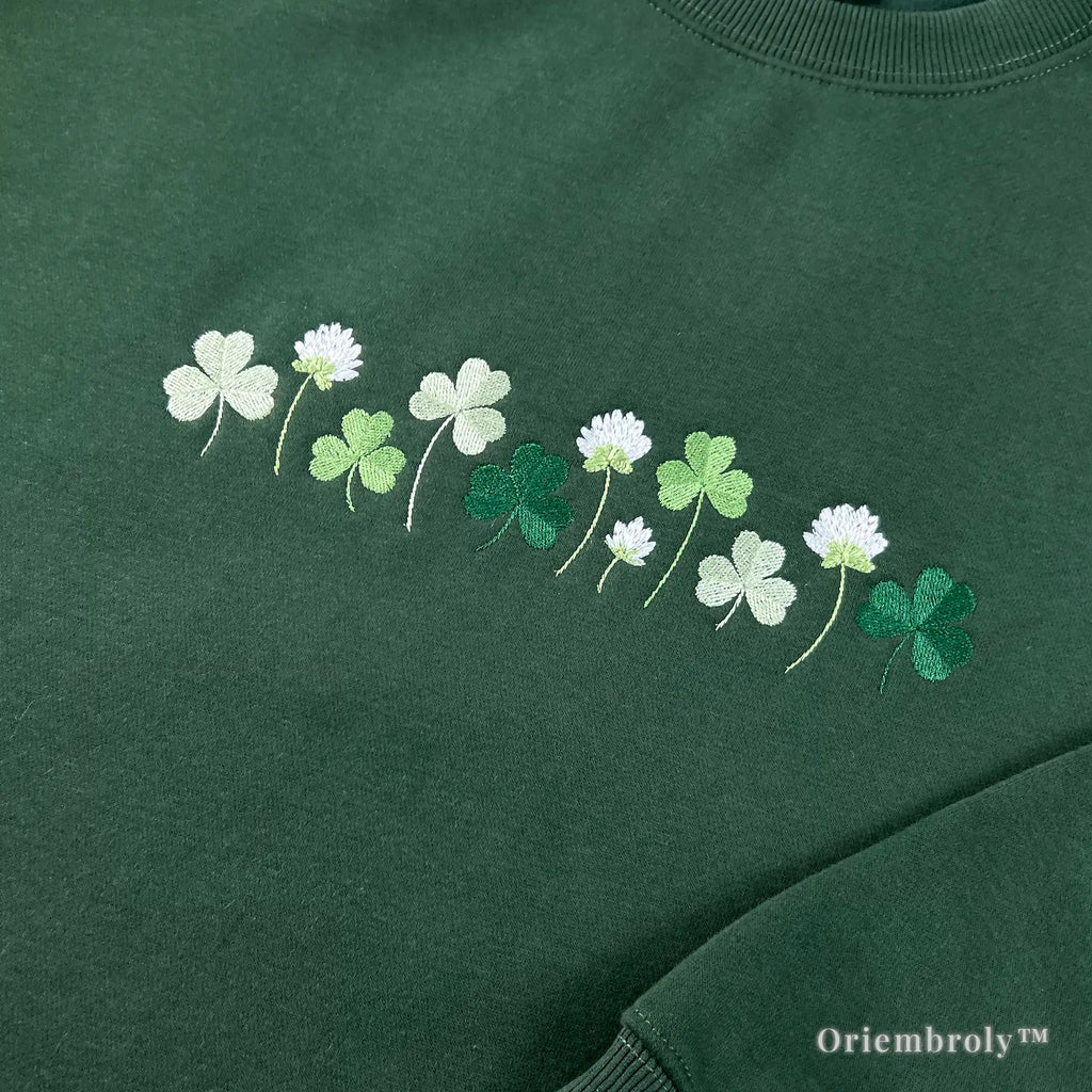 close up shamrock and four leaf clover embroidery detail